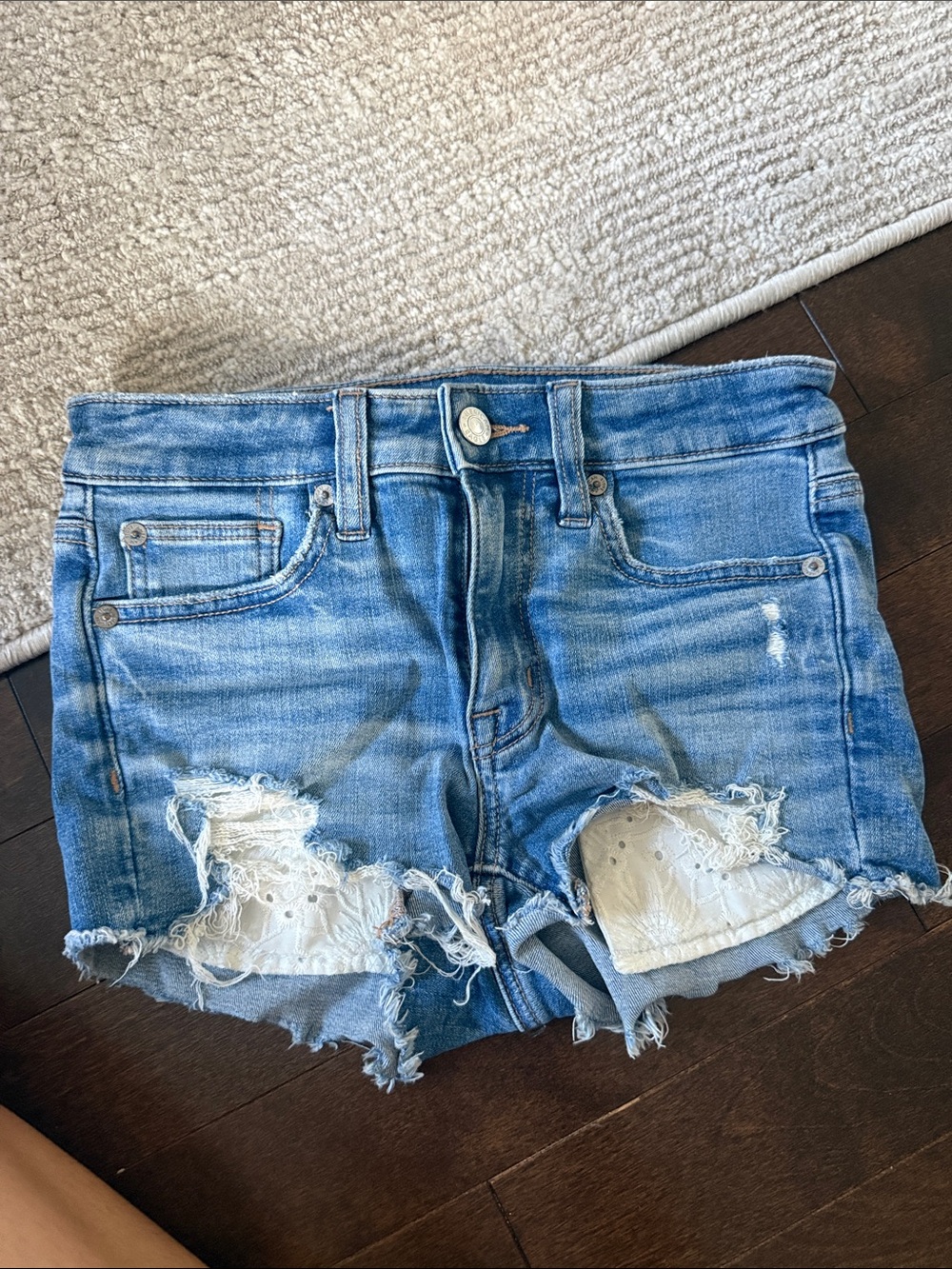 American Eagle Outfitters Light Blue Distressed Denim Shorts with White Lace